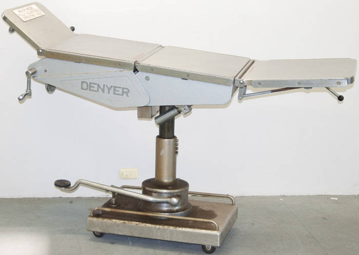 Multi adjustable operating table by Denyer of Melbourne.