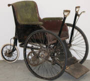 Circa 1920's 3 wheeled wheel-chair with gear system and hand powered drive mechanism.