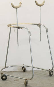 Metal walking frame with underarm supports.