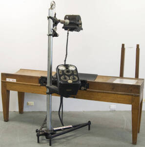 Early wooden x-ray table with x-ray machine by Watson Victor Ltd.