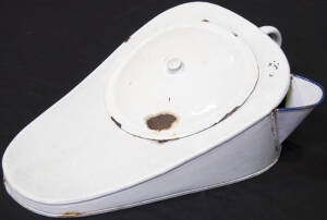 Metal lidded bedpan.