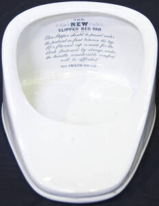 "The NEW Slipper Bed Pan" (ceramic).