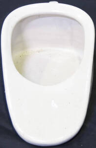 Ceramic bed pan.