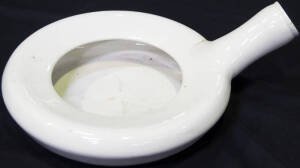 Ceramic bed pan.