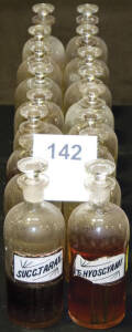 DISPENSING BOTTLES, identical set, with painted & printed labels, 22cm tall, all in good condition, and all with stoppers.