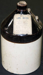Ceramic two toned bottle (handle broken off) used to store "Pure Lime Water".