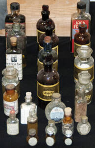 DISPENSING & SMALL BALM BOTTLES, with polished pontils, labels, all in good condition, all with lids stoppers.