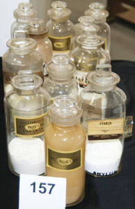 DISPENSING BOTTLES, with polished pontils, labels, 22cm tall, all in good condition & all with stoppers.
