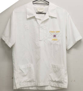 White student nurse over-shirt for Prince Henry Hospital with P.H.H. emblem on pocket.