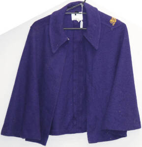 Dark purple woollen poncho with 'P.H.H.' (Prince Henry's Hospital) embroidered on shoulder.