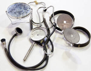 Two head mirrors, two hand mirrors, two stethoscopes and attachment. Mixed condition.