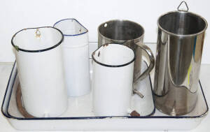 Six douche cans plus 2 large enamelled trays.