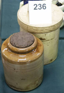 STONEWARE CONTAINERS: Large stoneware jars with lids.