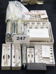 Six boxes of hypodermic syringes plus many loose syringes