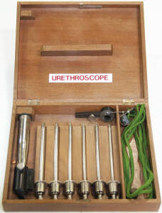 Urethroscope kit in wooden box. Appears complete.