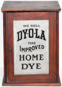 "DYOLA" home dye cabinet; with internal shelves and a few empty "Dyola" boxes.