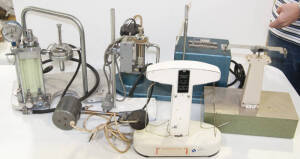 Various mechanical and electrical equipment including scales, a suction unit, etc.