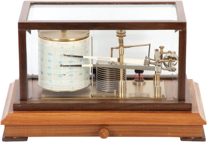 BAROGRAPH: By Negretti and Zambra of London, walnut and bevelled glass case with drawer containing spare paper. VG condition