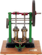 Engineers model engine with plaque, "2 cylinder constant flow water pump (1830), scale 1"-1ft. Model by Ron Gray 1980", working model in copper, brass and green and red painted steel on wooden base. 46cm, VG condition.