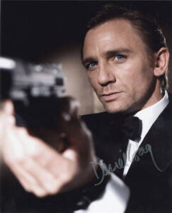JAMES BOND 007: Signed photographs of Daniel Craig & Pierce Brosnan. With CoAs.