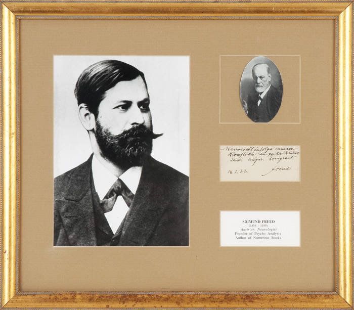 SIGMUND FREUD (1856-1939): Austrian Neurologist & founder of Psychoanalysis: Autograph & note on business card of Dr Siegfried Bernfeld of Vienna, dated 18/2/1922. Window mounted framed display with portraits. 45 x 39cm overall. Excellent condition.