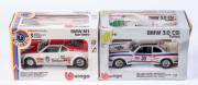 BURAGO: 1:24 BMW 3.0 CSI Turbo (116); And, BMW M1 Marlboro (169). All mint in original cardboard boxes and labels. (2 items)