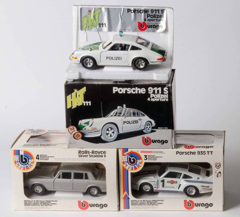 BURAGO: 1:24 Porsche 935 TT (142). And, Porsche 911S Polizei (111); And, Rolls-Royce Silver Shadow II (134). All mint in original cardboard boxes and labels. (3 items)