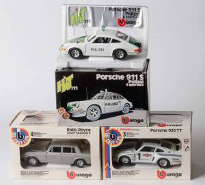 BURAGO: 1:24 Porsche 935 TT (142). And, Porsche 911S Polizei (111); And, Rolls-Royce Silver Shadow II (134). All mint in original cardboard boxes and labels. (3 items)