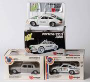 BURAGO: 1:24 Porsche 935 TT (142). And, Porsche 911S Polizei (111); And, Rolls-Royce Silver Shadow II (134). All mint in original cardboard boxes and labels. (3 items)