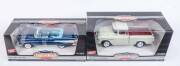 ERTL: 1:18 1955 Chevy 3100 Cameo White; And, 1957 Chevy Bel Air Blue. All mint in original cardboard boxes. 