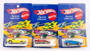 MATTEL: Group of Hot Wheels Die-Cast Metal 1970s Including 'Show-Off' Yellow (6982); And, 'Sand Witch' Red (6974); And, 'Buzz Off' (6976) Most mint condition in original packaging. (3 items)