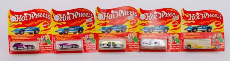 MATTEL: Hot Wheels Group of 1970s 'Custom Miniatures' Including Rear Engine Snake (5856) Yellow; And, Open Fire (5881) Purple; And, Side Kick (6002) Yellow. All min in original cardboard packaging. (5 items)