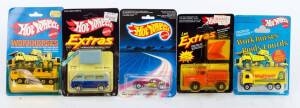 MATTEL: Hot Wheels Group form the 1970s-80s Including 'Workhorses' Construction Crane (3254); And, 'Extras' Sunagon (4340); And Wind Splitter (9539). All mint in original cardboard packaging. (23 items)