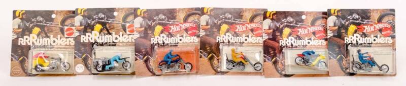 MATTEL: A Group of Hot Wheels Die-Cast Metal 'RRRumblers' 1970's Including 'Rip Snorterl' Blue Figure; And, 'Mean Machine' Blue Figure; And, 'Roamin Candle' Blue Figure. Most Mint condition, all in original packaging. (6 items)