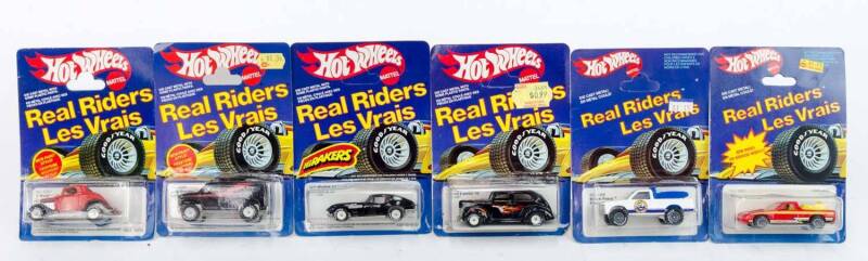 MATTEL: Hot Wheels Group of 'Real Riders' from the 1970s-80s Including Beach Patrol (4368); And, Split Window 63 (4354); And, 40's Ford 2-Door. All mint in original cardboard packaging. (13 items)