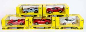 JOUEF EVOLUTION: 1:18 Group including Ford GT-40 Le Mans 69 (3008); And, Ferrari 330 P4 (3005); And, 1973 Porsche 911 Carrera RS 271 (3201). All mint in original cardboard packaging. (5 items)