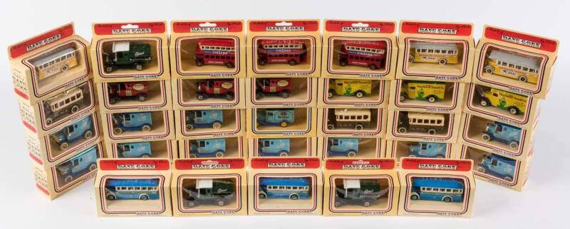 LLEDO: Group of 'Models of Days Gone' including Lindt Chocolate Van; And, BOAC Corporation Transport Bus. All Mint in original cardboard boxes. (33 itmes) 