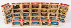 LLEDO: Group of 'Models of Days Gone' including Lindt Chocolate Van; And, BOAC Corporation Transport Bus. All Mint in original cardboard boxes. (33 itmes) 