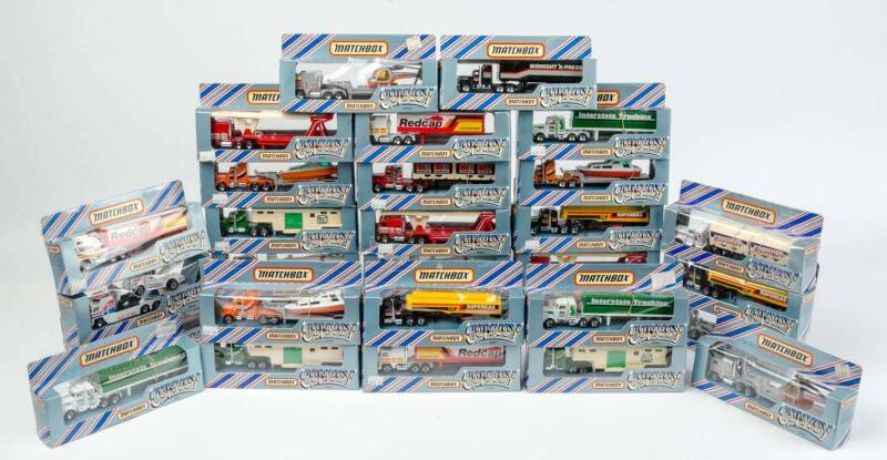 MATCHBOX:  A Group of Model Trucks 'Convoy' Including Truck with Boat and Trailer (CY4); And, ACE Interstate Trucking Truck with Trailer (CY5); And, ACE Truck with Helicopter and Trailer (CY11). Most Mint, all in original cardboard boxes see image for con