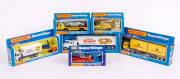 MATCHBOX: Group of 'Super Kings' Model Cars and Trucks Including Container Truck (K-17); And, Delivery Truck and Fork Lift (K-40); And, Dodge Monaco Fire Chief (K-67). Most Mint, all in original cardboard packaging. (12 items)