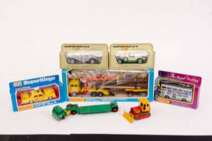 MATCHBOX: Group of Model Cars Including SuperKings Log Transporter (K-43); And, SuperKings  Plymouth 'GF' Taxi (K-79); And, The Commemorative Royal Wedding of Pince of Wales and Lady Diana Spencer (KRW-15). Most Mint, Most in original cardboard boxes. (21