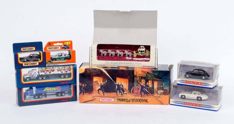 MATCHBOX: Group of Model Cars and Trucks Including 1936 Leyland Cub FK-7 Fire Engine (YFE08); And, The Old Londonderry Land Rover (YFE02/B); And, 'Dinky' 1955 Mercedes Benz 300SL Gullwing (DY-12). All mint in original cardboard packaging. (98 items)