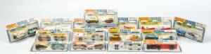 MATCHBOX: &nbsp;A Group of Matchbox 900 Including Car and Boat with Trailer (TP-5); And, Car and Bikes with Trailer (TP-31); And, Car with Caravan (TP-28). Most Mint, all in original cardboard boxes see image for condition. (14 items)