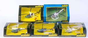 SOLIDO Helicopter Group: Elicottero Poliza (381B); And, Helico Gazelle Gendarmerie (381B); And, Helico Gazelle ' Europ'assistance ' (381A); Elicottero Carabinier (381A); And, Air Secours International. All mint in original cardboard boxes and labels. (5 i