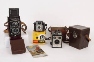 ROLLEIFLEX twin lens reflex camera with Carl Zeiss 75mm lens (c1954) in ever ready leather case and booklet; ZEISS IKOFLEX twin lens reflex camera in case (c1952); BROWNIE STARLET camera in box; BROWNIE FLASH II box camera. G/VG condition.