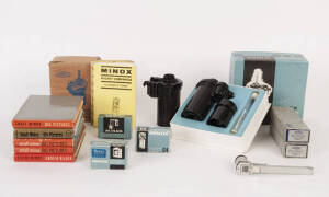 MINOX Range: Daylight developing tank set in box; Daylight developing tanks (2); Filter sets (2); Right angle finder model B (2); Right angle finders (2); Flashgun C4; Tripod; Tripod heads (3); Thermometers (2); Transparency cutters (2); Books and booklet