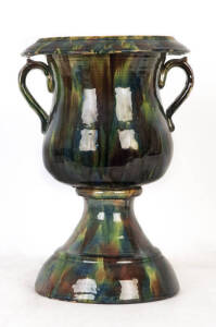 JOHN CAMPBELL (attributed): Tasmanian Colonial pottery garden urn. Built in (2) section, inverted bell shaped with 2 handles. Green/blue & brown majolica glaze. Damaged rim, old repairs, missing a 7cm piece of rim. Rare in any condition.