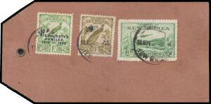 1935 (Nov 18) registered gold bullion parcel tag with Bulolo &pound;5 green & Undated Birds 5/- 'AIR MAIL' & 1d 'JUBILEE' overprints tied 'WAU/NEW GUINEA' d/s with violet 'R/WAU/..2133' cachet on back paying 157 times 2d letter rate, 314 times 3d per &frac12;oz airmai