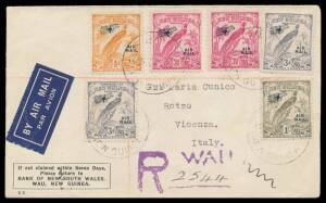 1936 (Nov 14) Bank of New South Wales, Wau, New Guinea cover sent registered airmail to Italy with Undated Birds &frac12;d, 3d x2, 3&frac12;d x2 & 1/- 'AIR MAIL' overprints tied 'WAU/NEW GUINEA' d/s and 'R/WAU' cachet paying 1&frac12;d surcharge for internal airmail Wau to Po