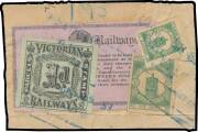 RAILWAY STAMPS - 1887 Queen Victoria Black on Coloured Papers ½d black/mauve over-stamped with 1902-05 1d black/pale green - torn before being affixed - plus South Australia 1885 'V R' Perf 12 ½d green & 1d green all tied by multiple strikes of a very lar